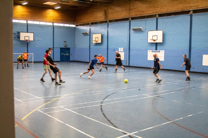 students play ball in a sport hall
